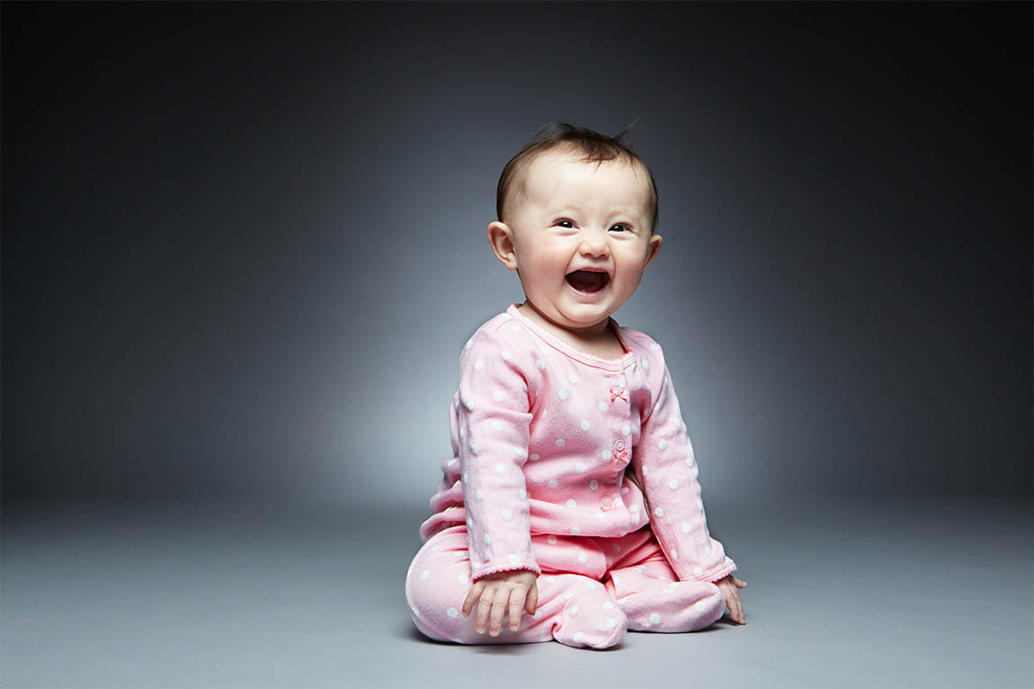 Studio portrait of joyful child