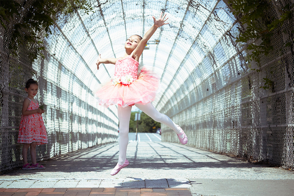 Outdoor, natural light portrait of young ballet dancer