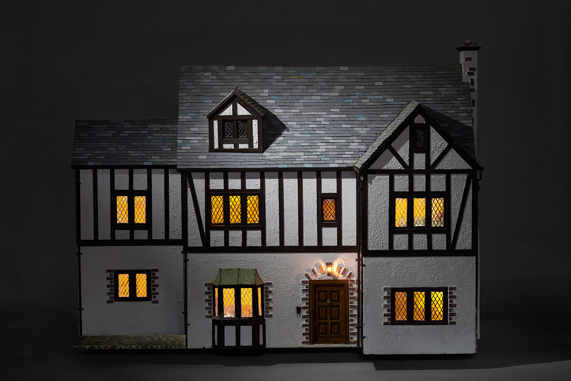 Bespoke dollhouse exterior at night