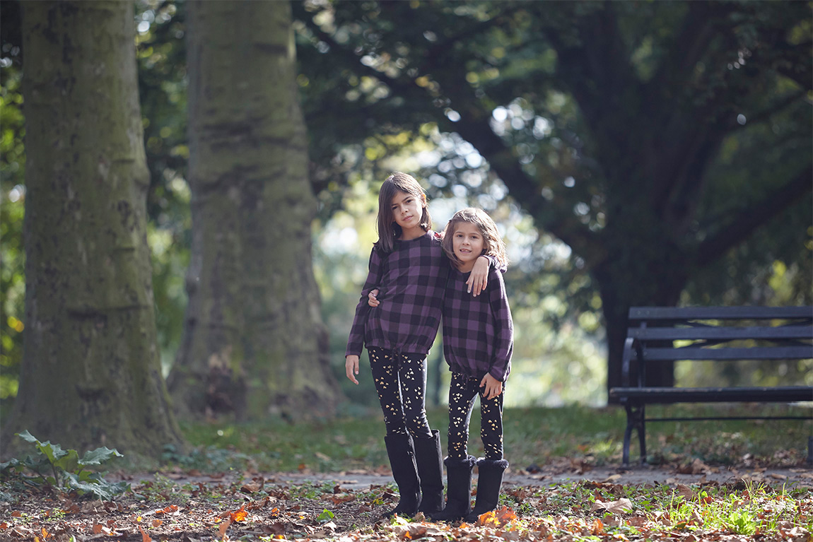 Outdoor, natural light portrait of siblings